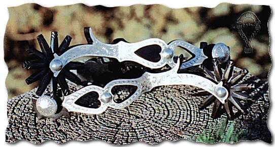 Silver overlaid spurs